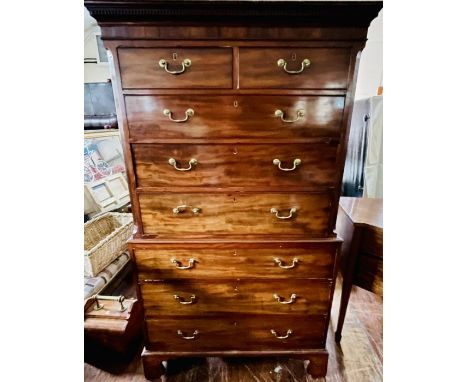 A George III mahogany chest on chest, circa 1800, dental cornice over a moulded frieze, above two short and three long gradua