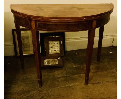 A George III mahogany demilune folding card table with line inlay on square tapering legs, 73cm h x 100cm w x 43cm d