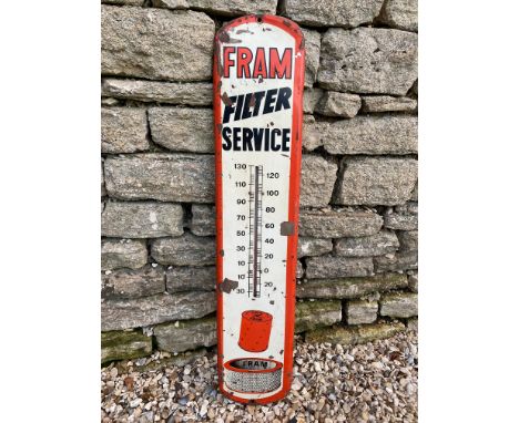 A Fram Filter Service tin thermometer, 8 x 38 1/2". 