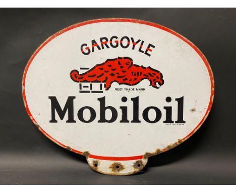 A Gargoyle Mobiloil double sided enamel advertising pediment sign from an oil cabinet. 