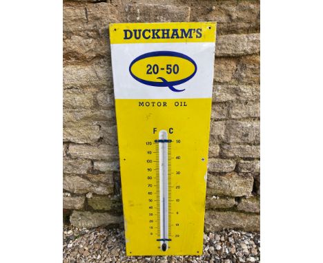 A Duckham's 20-50 Motor Oil enamel thermometer, 13 x 36". 
