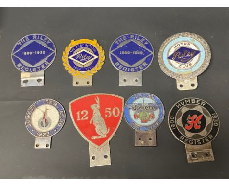 Eight assorted car badges relating to Riley, Humber, Jowett and Alvis.