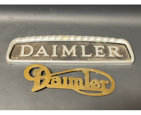A Daimler commercial vehicle radiator name plate, 15 x 4 1/4" plus a Daimler brass cript badge. 