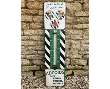 A Duckham's Adcoids black and white enamel thermometer, 11 x 45 1/2".