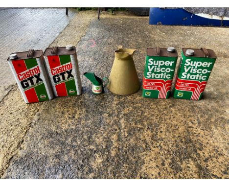 Two Castrol GTX gallon cans, two BP gallon cans, a gallon oil measure and a small BP anti-freeze measure.