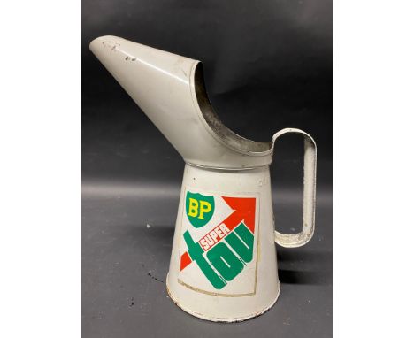 A BP Super Tou quart oil measure. 