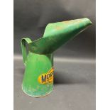 A Morris's of Shrewsbury Golden Film Lubricants quart measure.