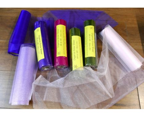 Four as new and sealed rolls of Organza Snow sheer fabric, 29 cm x 25 m, and 3 part used rolls, ideal for table dressing, cha