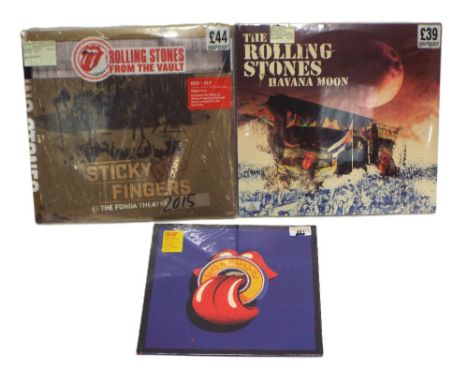 Three Rolling Stones sealed records, two LP's, Sticky Fingers and Havanna Moon, and 12" Rolling Stones, She's A Rainbow Live 