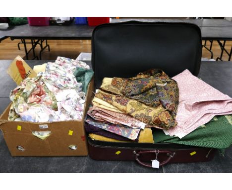 Suitcase and box of fabric off cuts and sections, floral patterned cotton and heavy tapestry/velvet fabric.