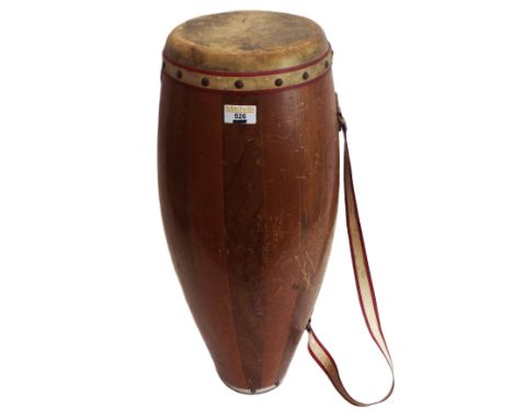 Cuban style conga drum, made with wooden staves in the traditional manner with strap