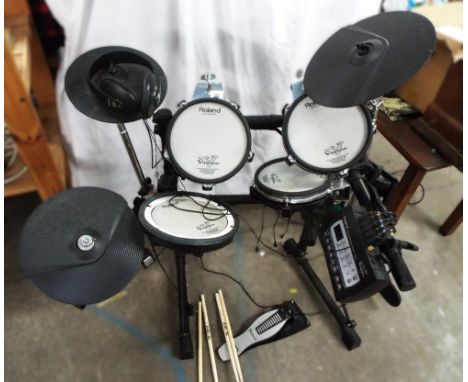 Rowland electric drum set with Rowland Percussion Sound Module TD-3, symbols, foot pedal, headphones and kick drum pedal (not