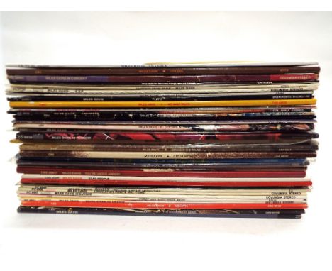 Collection of 35 Miles Davies jazz LP's and a Miles Davies In Concert programme and ticket for Wembley Conference Centre Nove