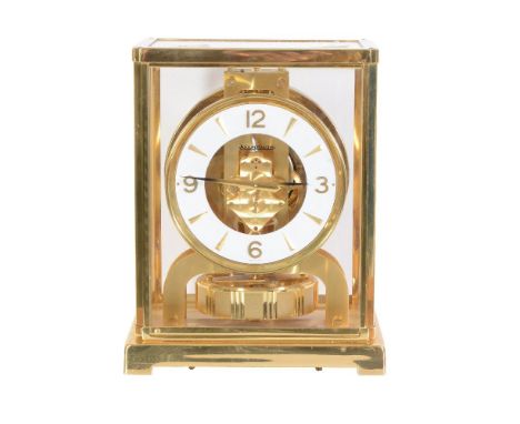 A gilt brass 'Atmos' timepiece, Jaeger-LeCoultre, second half 20th century, the single train movement wound via the expansion