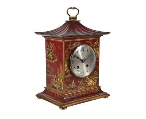 A red lacquered bracket clock, probably HAC, circa 1920, with German gong striking movement, the silvered Arabic numeral dial