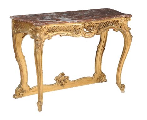 A carved giltwood and marble mounted console table, in Louis XV style, late 19th/early 20th century, the pierced frieze incor