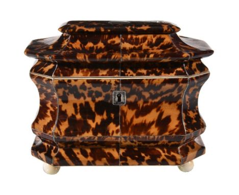 Y A Regency tortoiseshell veneered, ivory banded and silver coloured metal strung tea caddy, circa 1815, of canted rectangula