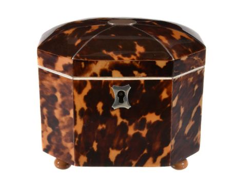 Y A George III tortoiseshell veneered, ivory banded and silver coloured metal strung tea caddy, last quarter 18th century, of