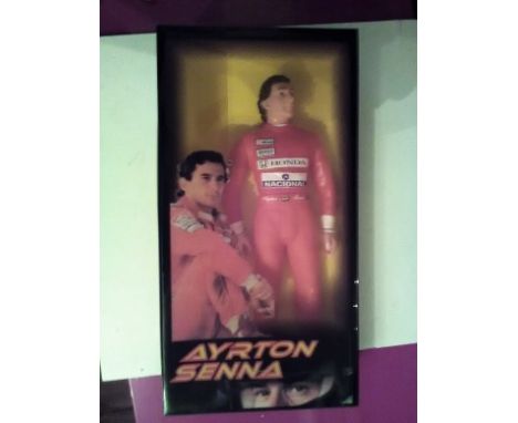 Ayrton Senna model in red race suit by Tot Toys Brazil Models 1:6 scale in original box and packaging in good condition. Ship