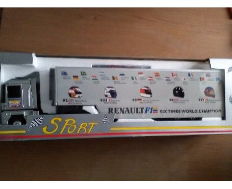 Renault F1 Six Times World Champion diecast model racing car transporter, 1992 Nigel Mansell, 1993 Alain Prost, 1995 Michael 