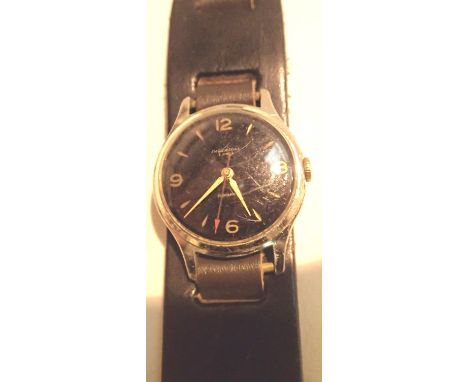 Ingersoll vintage black face wristwatch. Working at lotting. P&amp;P Group 1 (£14+VAT for the first lot and £1+VAT for subseq