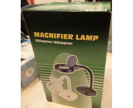 Boxed new old stock magnifier lamp. P&amp;P Group 1 (£14+VAT for the first lot and £1+VAT for subsequent lots) 