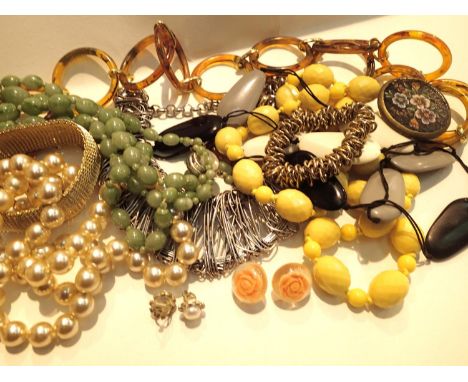 Five necklaces and two bracelets with vintage plastic belt earrings and rings. P&amp;P Group 1 (£14+VAT for the first lot and
