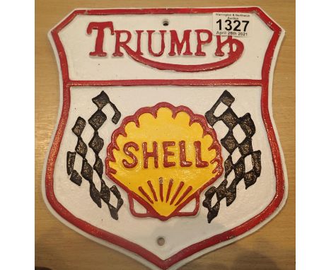 Cast iron Triumph shell sign, L: 24 cm. P&amp;P Group 1 (£14+VAT for the first lot and £1+VAT for subsequent lots) 