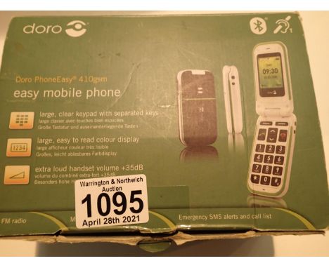 Retro Doro boxed mobile telephone. P&amp;P Group 1 (£14+VAT for the first lot and £1+VAT for subsequent lots) 