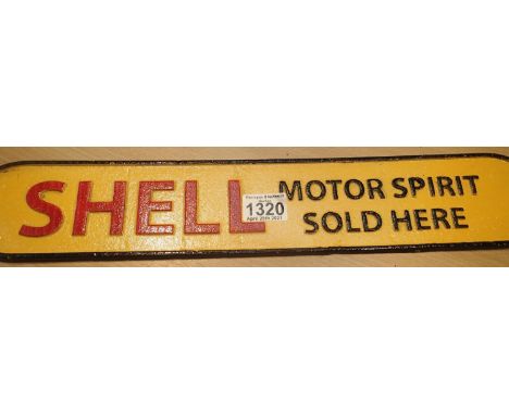 Cast iron Shell motor oil sign, L: 62 cm. P&amp;P Group 2 (£18+VAT for the first lot and £3+VAT for subsequent lots) 