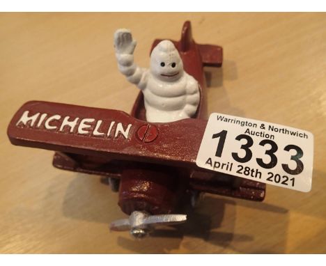 Cast iron Michelin Man sign, L: 13 cm. P&amp;P Group 1 (£14+VAT for the first lot and £1+VAT for subsequent lots) 