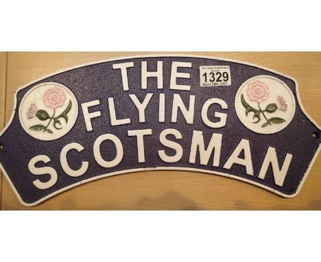 Cast iron The Flying Scotsman sign, W: 40 cm. P&amp;P Group 1 (£14+VAT for the first lot and £1+VAT for subsequent lots) 