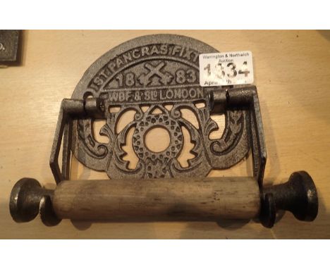 Cast iron St Pancras toilet roll holder, W: 19 cm. P&amp;P Group 1 (£14+VAT for the first lot and £1+VAT for subsequent lots)