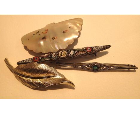 Four brooches including a micro mosaic example. P&amp;P Group 1 (£14+VAT for the first lot and £1+VAT for subsequent lots) 