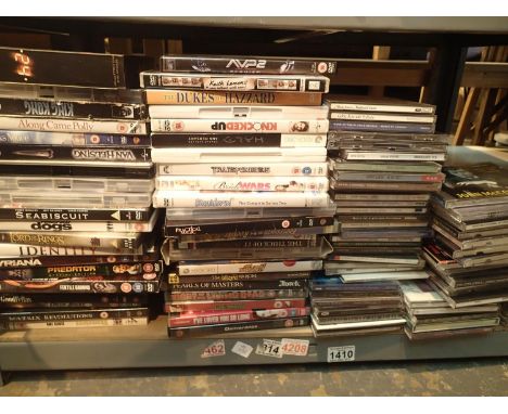 Shelf of mixed CDs and DVDs. Not available for in-house P&amp;P, contact Paul O'Hea at Mailboxes on 01925 659133 