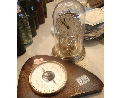 Clock teak cased wall mounted barometer and a cased anniversary clock. Not available for in-house P&amp;P, contact Paul O'Hea