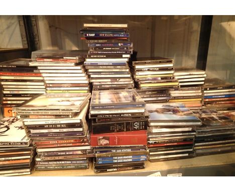 Shelf of mixed music cds. Not available for in-house P&amp;P, contact Paul O'Hea at Mailboxes on 01925 659133 