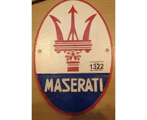 Cast iron Maserati sign, L: 29 cm. P&amp;P Group 1 (£14+VAT for the first lot and £1+VAT for subsequent lots) 