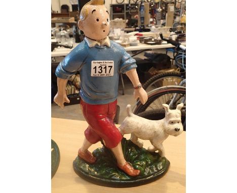 Cast iron TinTin and Snowy doorstop, H: 33 cm. P&amp;P Group 2 (£18+VAT for the first lot and £3+VAT for subsequent lots) 