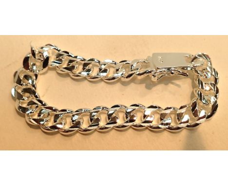 Silver curb link bracelet with safety catch. P&amp;P Group 1 (£14+VAT for the first lot and £1+VAT for subsequent lots) Condi