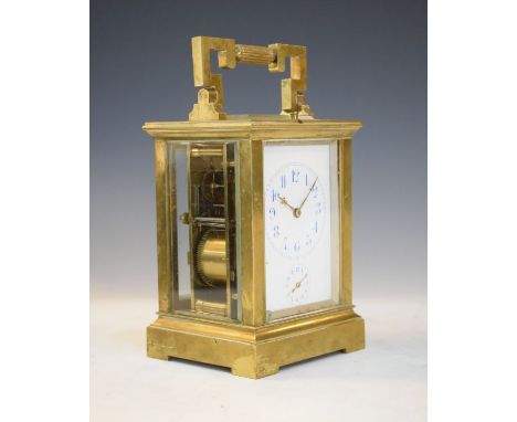 Large French brass cased carriage clock by E. Maurice & Co, having a repeat movement, white enamel dial with Arabic numerals 