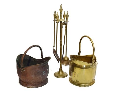 Small group of metal ware comprising: brass companion set of shovel, poker, tongs and brush, a brass fire helmet and a simila