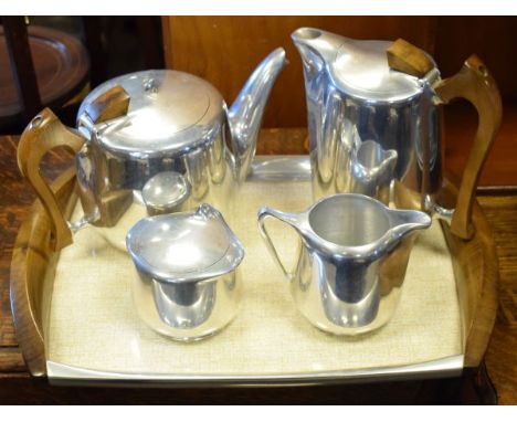 Picquot Ware five piece tea service comprising: teapot, hot water jug, lidded sugar basin, milk jug and two handled tray, wit