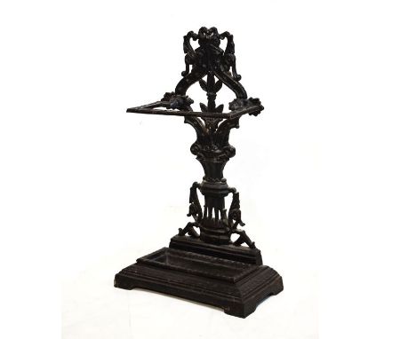 Black painted cast iron stick stand of pierced foliate design with removable tray   Condition: 