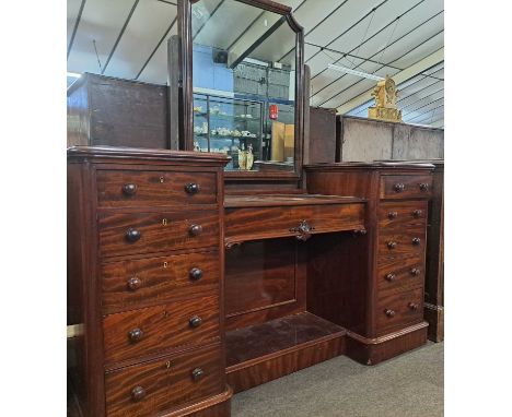 Victorian mahogany twin pedestal drop centre dressing chest with ten drawers and a central adjustable mirror, 153cm wide