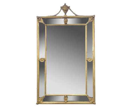 A decorative 19th century gilt framed wall mirror with urn and swag mount 88 x 51cm