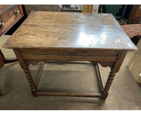 An 18th Century oak rectangular side table raised on bobbin turned legs with base stretcher, 72cm wide