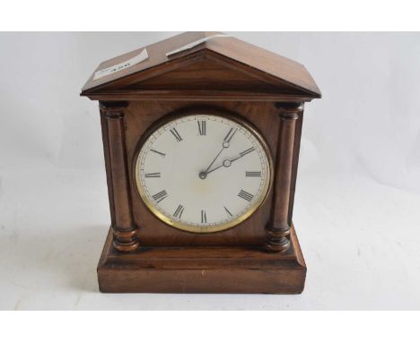 Mantel clock with white enamel dial and black Roman numeral face