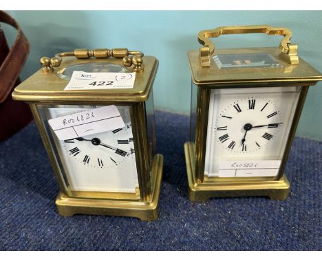 Two small carriage clocks and a further carriage clock case