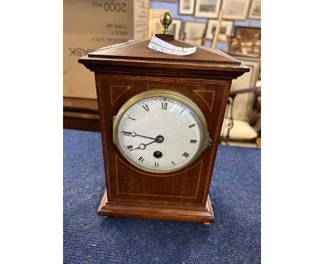 Early 20th Century mantel clock, white enamel dial with Roman numerals, the case with typical inlay